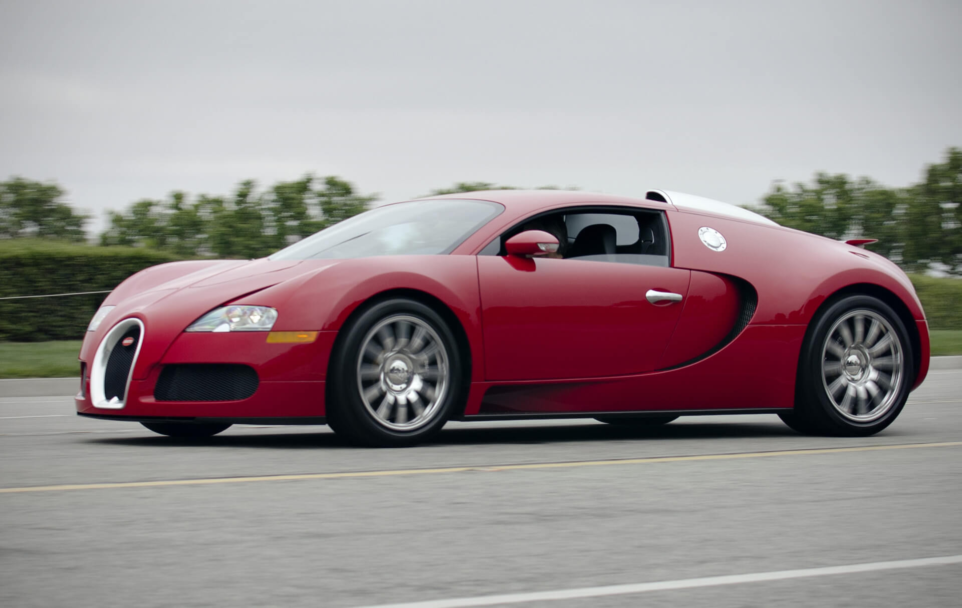 Red Bugatti Veyron on the road